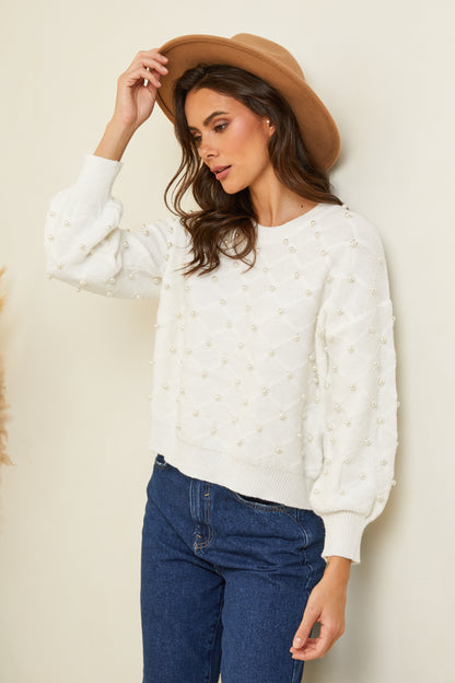 Pull surpiqué avec perles