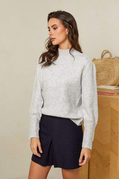 Pull col cheminé avec détails perles