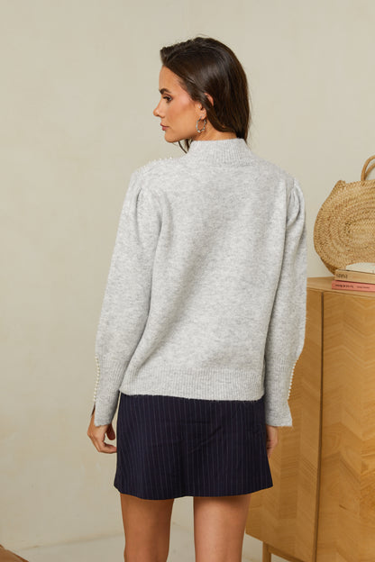 Pull col cheminé avec détails perles