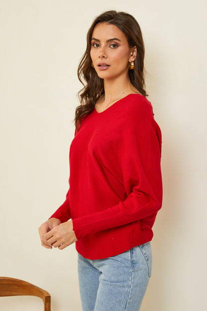 Pull col V avec détails broderie